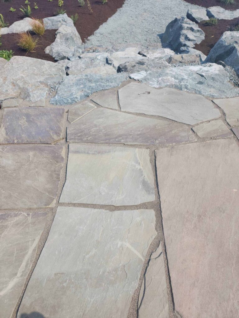 20230825_115929-scaled Landscaping example: Close up of several stone textures on a staircase and pathway.