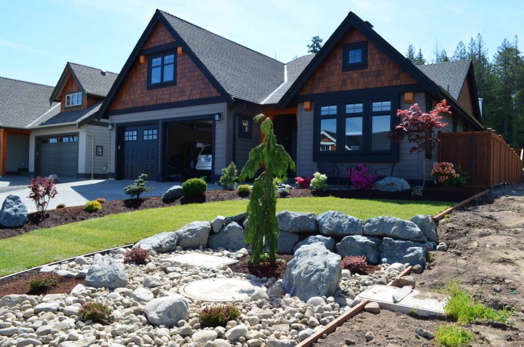 DSC_0819-scaled Landscaping example: View of the front of a home with small waterfall and landscaped areas, without losing the lawn.