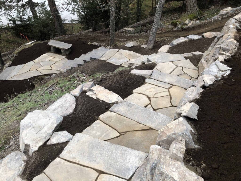 IMG_0544-scaled Landscaping example: Top view of stone walkway/stairs leading to a stone bench.
