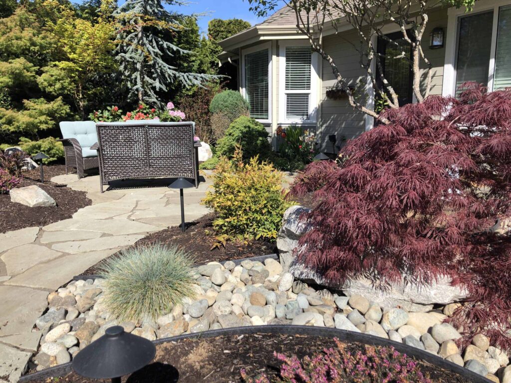 IMG_0777-scaled Landscaping example: A seating area within a private space featuring a stone pathway.