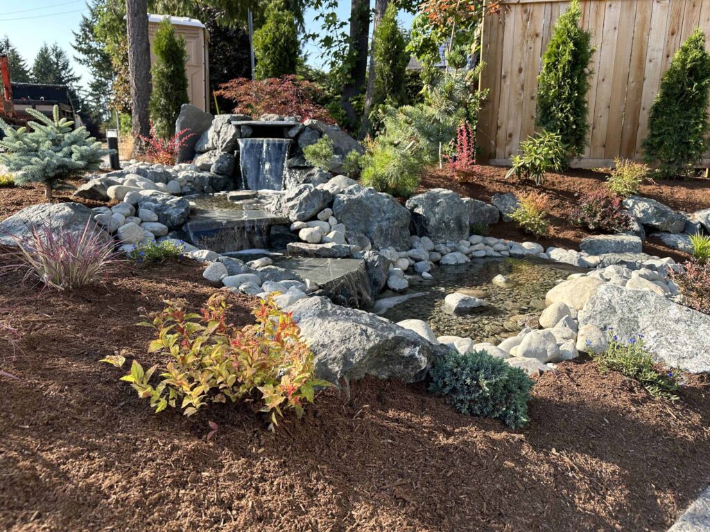 IMG_0795-scaled Landscaping example: Alternative view of 3 level waterfall feature, showing small creek bed