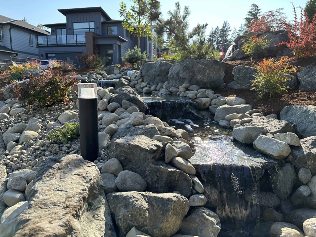 IMG_0800-scaled Landscaping example: Close up of light feature next to waterfall