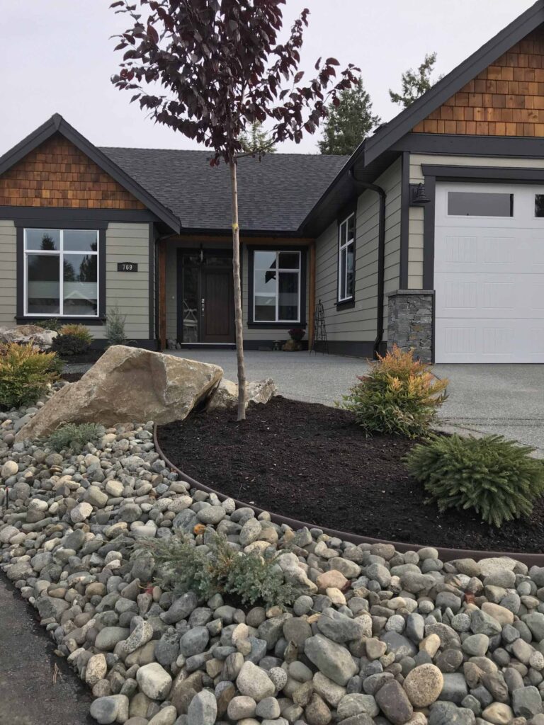 IMG_2171-scaled Landscaping example: dual section feature - soil garden and rock garden.