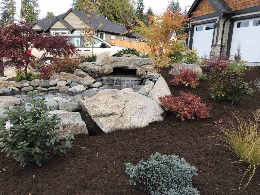 IMG_2220-scaled Landscaping example: view of the beginning of a waterfall feature