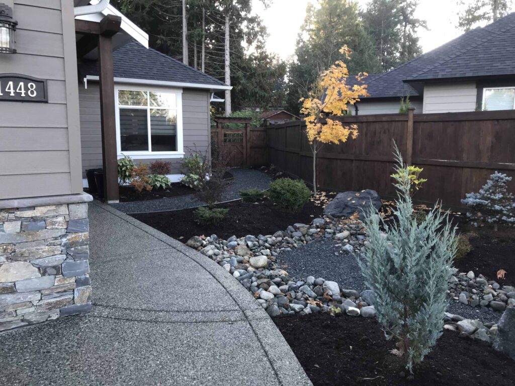 IMG_2318-scaled Landscaping example: low maintenance garden with rock feature.